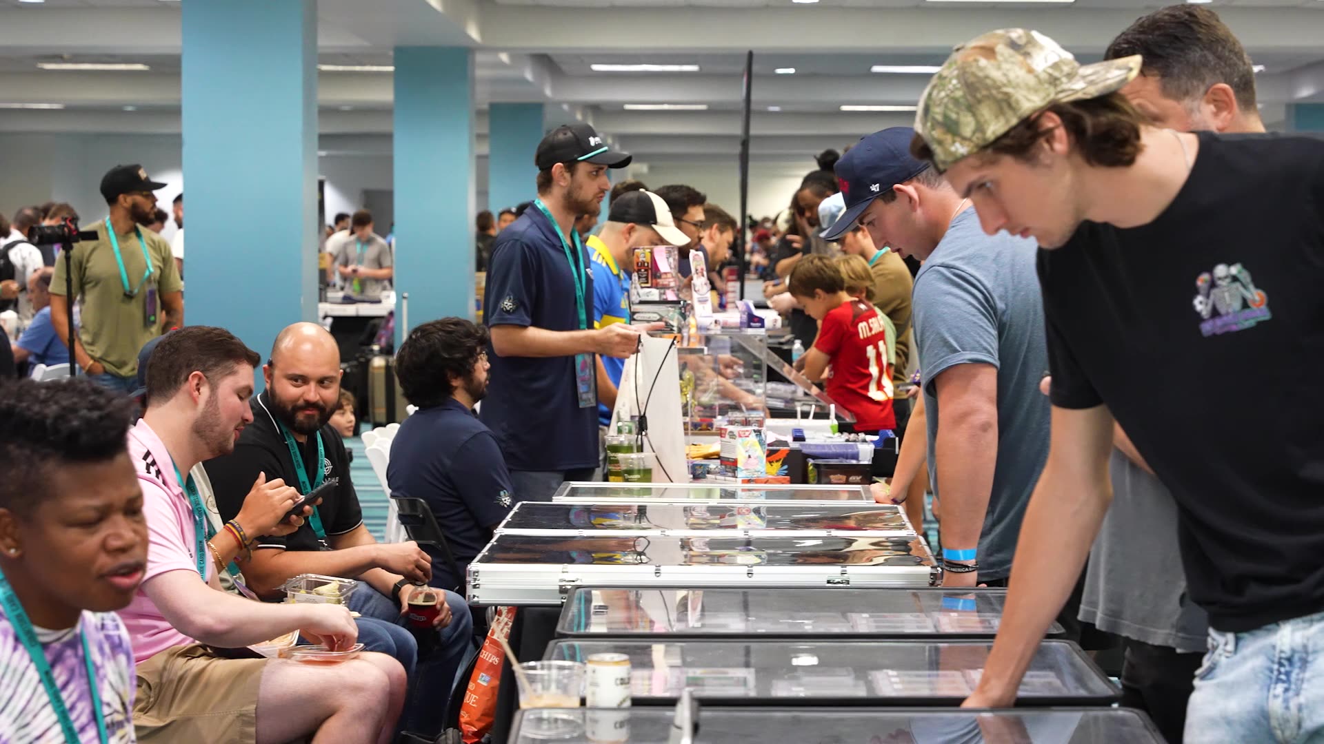 Courtside Cardshow Miami floor — collectors at the dealer tables